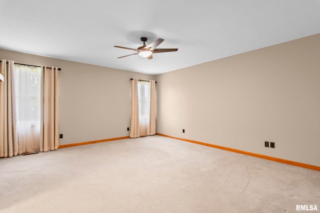 421 Turtle Dove Dr, Sherman, IL 62684 - unfurnished room featuring light colored carpet, a ceiling fan, and baseboards