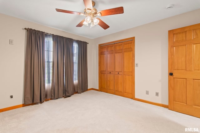 421 Turtle Dove Dr, Sherman, IL 62684 - unfurnished bedroom featuring baseboards, ceiling fan, a closet, and carpet