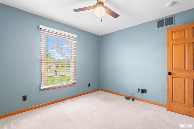 421 Turtle Dove Dr, Sherman, IL 62684 - spare room with visible vents, ceiling fan, carpet floors, and baseboards