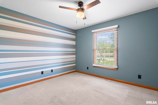 421 Turtle Dove Dr, Sherman, IL 62684 - spare room with baseboards, visible vents, a ceiling fan, and light colored carpet