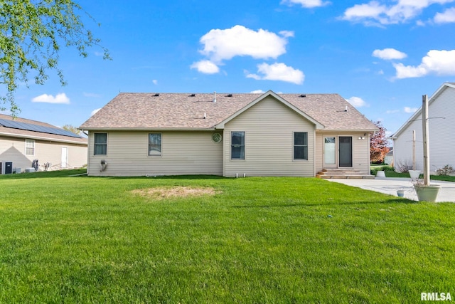 421 Turtle Dove Dr, Sherman, IL 62684 - back of property with roof with shingles, a yard, central AC unit, and a patio