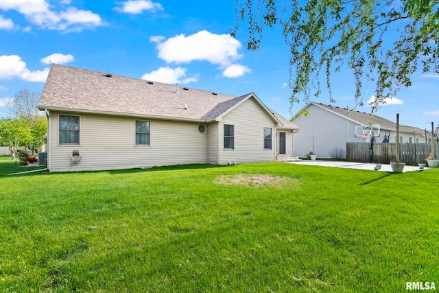 421 Turtle Dove Dr, Sherman, IL 62684 - rear view of house featuring a patio area, roof with shingles, fence, a yard, and central AC unit