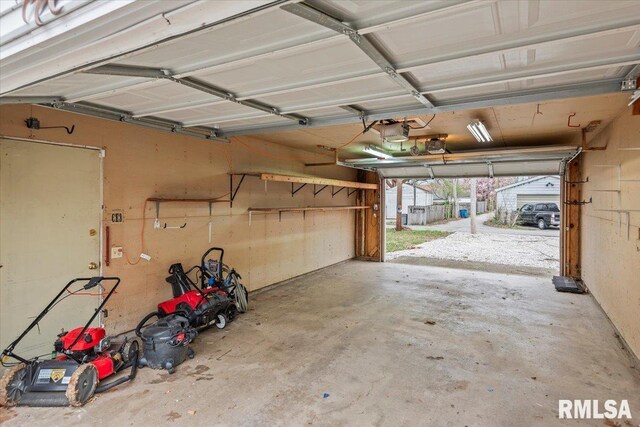 garage featuring a garage door opener
