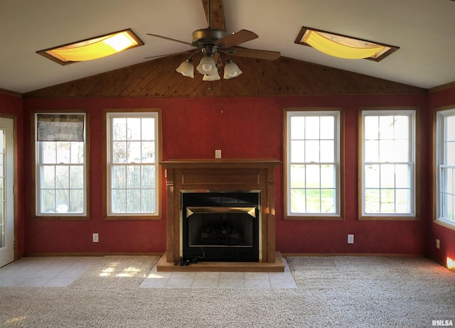 132 W Coal St, Wataga, IL 61488 - unfurnished living room with a wealth of natural light, carpet, a ceiling fan, and vaulted ceiling
