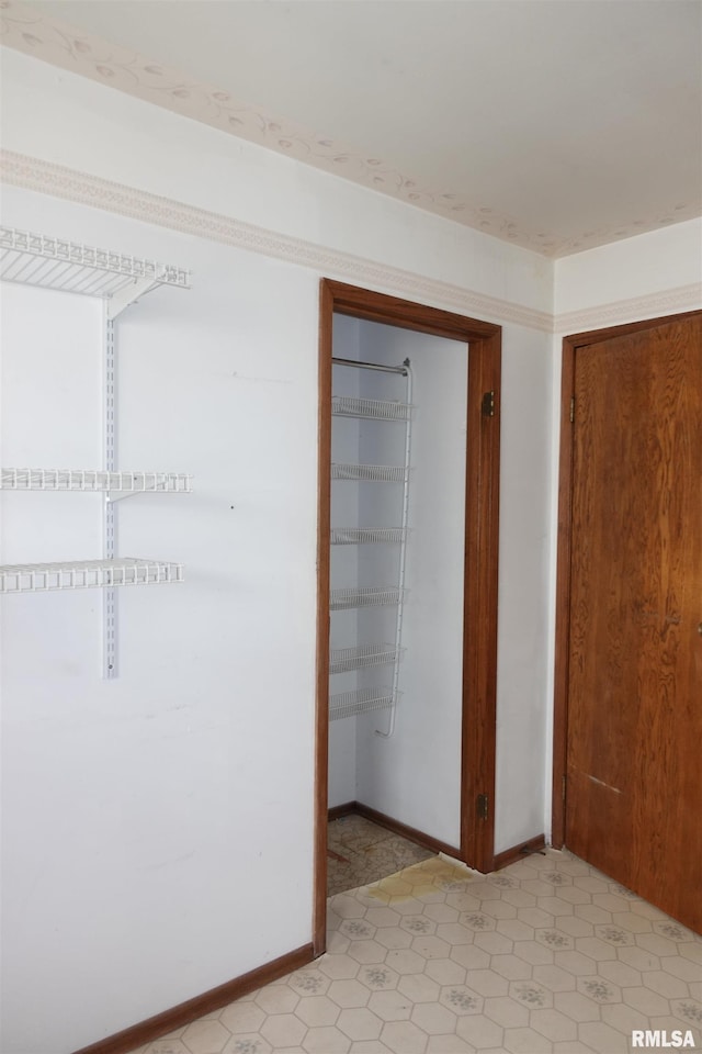 132 W Coal St, Wataga, IL 61488 - unfurnished bedroom featuring a closet and baseboards