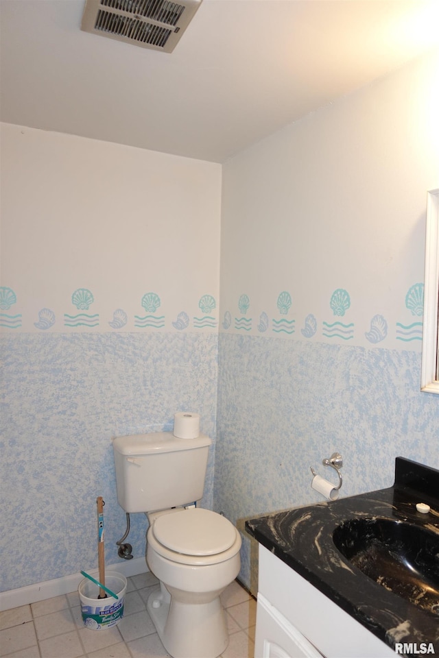 132 W Coal St, Wataga, IL 61488 - half bath featuring tile patterned floors, visible vents, toilet, wallpapered walls, and vanity