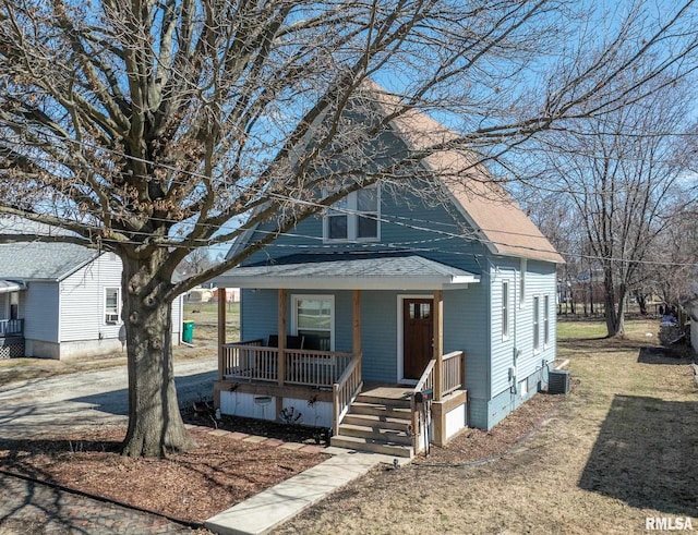 253 Day St, Galesburg, IL 61401 - view of front of property with cooling unit, a porch, and roof with shingles