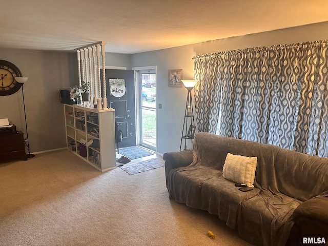 living room featuring baseboards and carpet flooring
