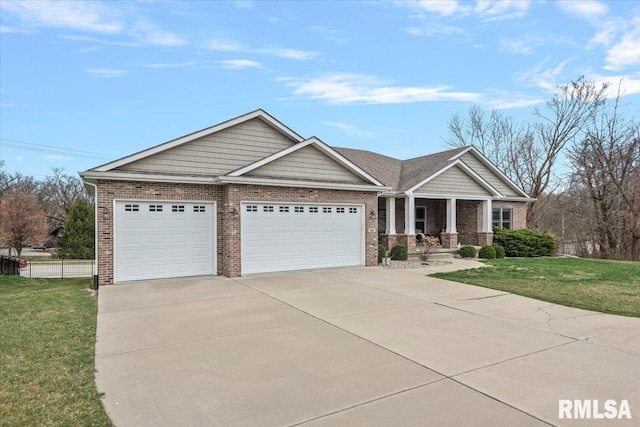 craftsman inspired home with an attached garage, driveway, a front yard, and brick siding