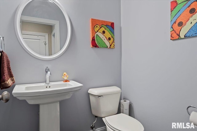 bathroom featuring toilet