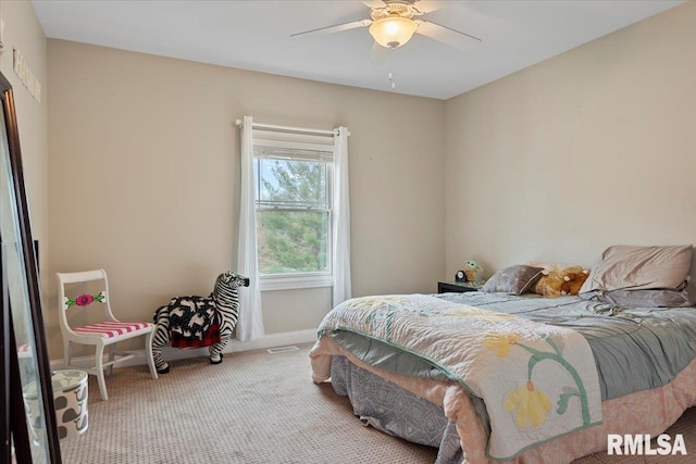 bedroom featuring baseboards, a ceiling fan, visible vents, and carpet floors
