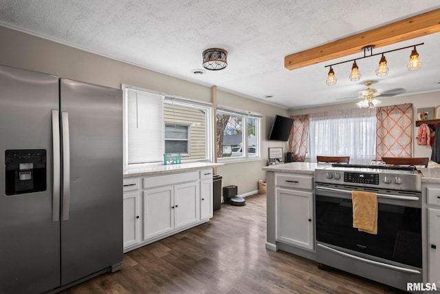 2364 E Keys Ave, Springfield, IL 62702 - kitchen featuring stainless steel appliances, a textured ceiling, light countertops, dark wood-style floors, and a ceiling fan