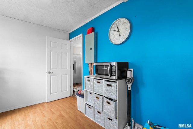 2364 E Keys Ave, Springfield, IL 62702 - home office with a textured ceiling and light wood-style flooring