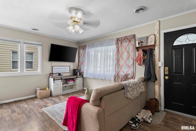 2364 E Keys Ave, Springfield, IL 62702 - living area featuring ceiling fan, crown molding, wood finished floors, baseboards, and a textured ceiling