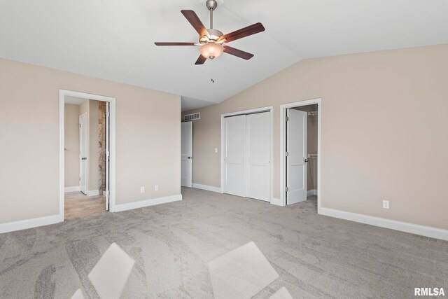 4602 Castle Pines Dr, Springfield, IL 62711 - kitchen featuring appliances with stainless steel finishes, a sink, vaulted ceiling, light wood-type flooring, and a center island