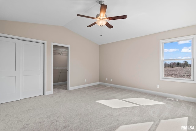 4602 Castle Pines Dr, Springfield, IL 62711 - carpeted empty room featuring lofted ceiling, ceiling fan, and baseboards