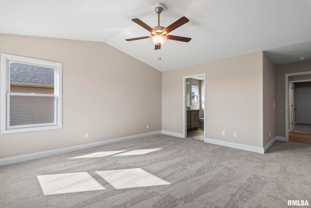 4602 Castle Pines Dr, Springfield, IL 62711 - unfurnished bedroom featuring carpet flooring, lofted ceiling, a closet, baseboards, and ensuite bathroom