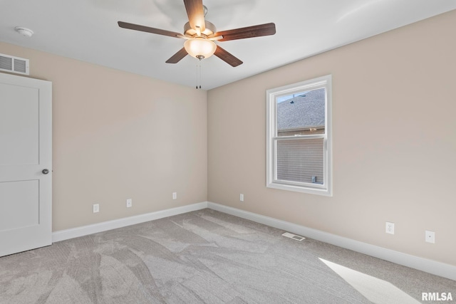 4602 Castle Pines Dr, Springfield, IL 62711 - unfurnished bedroom with two closets, light carpet, baseboards, and ceiling fan