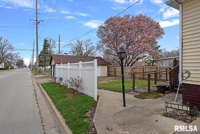 exterior space with fence private yard