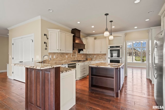 kitchen with open shelves, a peninsula, stainless steel appliances, custom range hood, and decorative backsplash