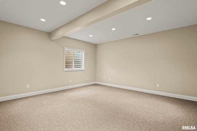 empty room featuring recessed lighting, carpet, baseboards, beam ceiling, and visible vents
