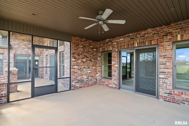 view of patio featuring a ceiling fan