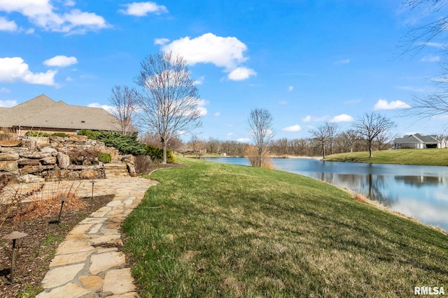 view of yard with a water view