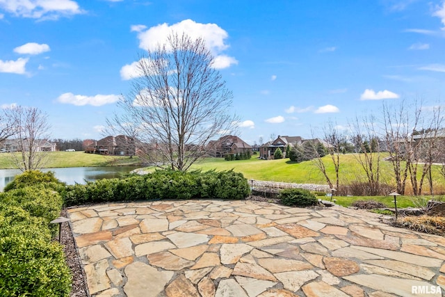 view of patio / terrace with a water view
