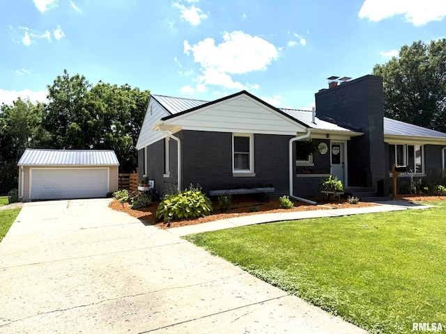 308 Galesburg Rd, Knoxville, IL 61448 - rear view of house featuring a chimney, brick siding, and a lawn