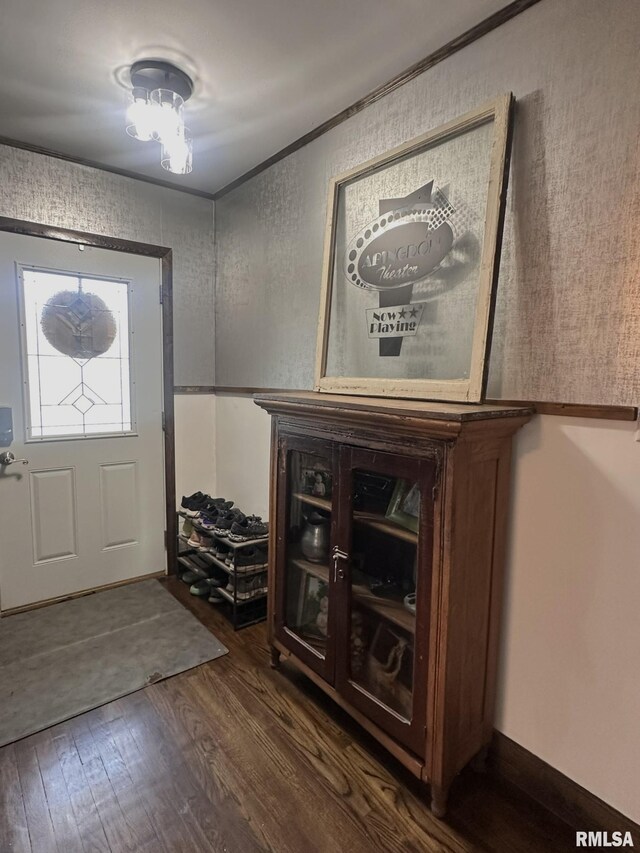 308 Galesburg Rd, Knoxville, IL 61448 - living room featuring wallpapered walls, a ceiling fan, wood finished floors, and wainscoting