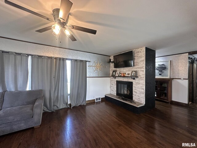 308 Galesburg Rd, Knoxville, IL 61448 - kitchen with wooden counters, ceiling fan, dark wood-style floors, dark brown cabinets, and a brick fireplace