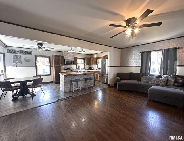308 Galesburg Rd, Knoxville, IL 61448 - kitchen featuring freestanding refrigerator, backsplash, dark wood finished floors, and a ceiling fan