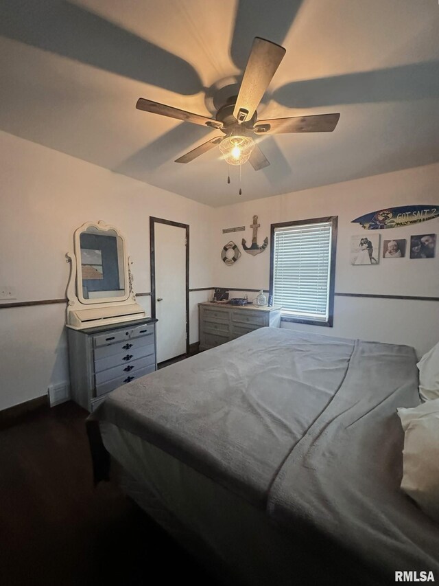 308 Galesburg Rd, Knoxville, IL 61448 - office featuring dark wood-type flooring and ceiling fan
