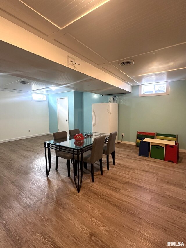 308 Galesburg Rd, Knoxville, IL 61448 - washroom with independent washer and dryer, light wood-style floors, and concrete block wall