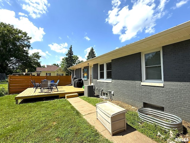 308 Galesburg Rd, Knoxville, IL 61448 - view of grassy yard with a deck and outdoor dining space