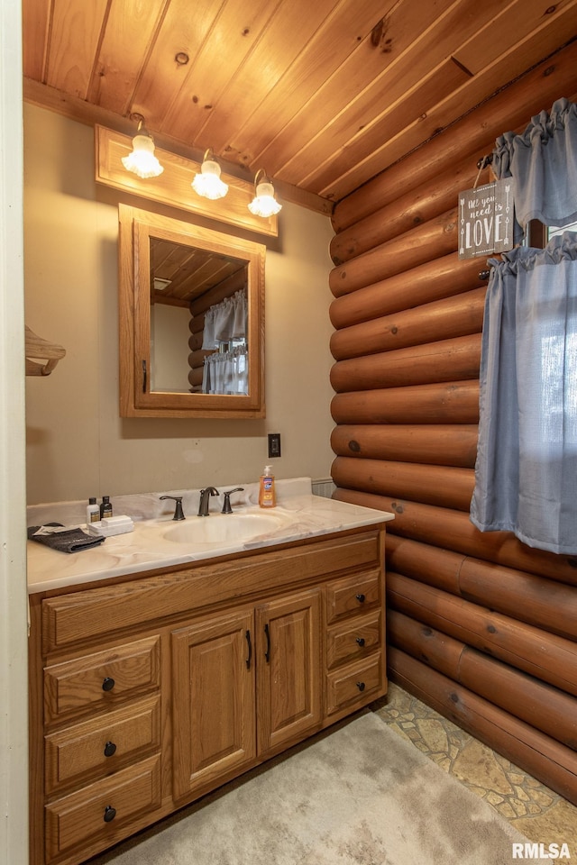 602 SE 13th St, Aledo, IL 61231 - bathroom with log walls, wood ceiling, and vanity