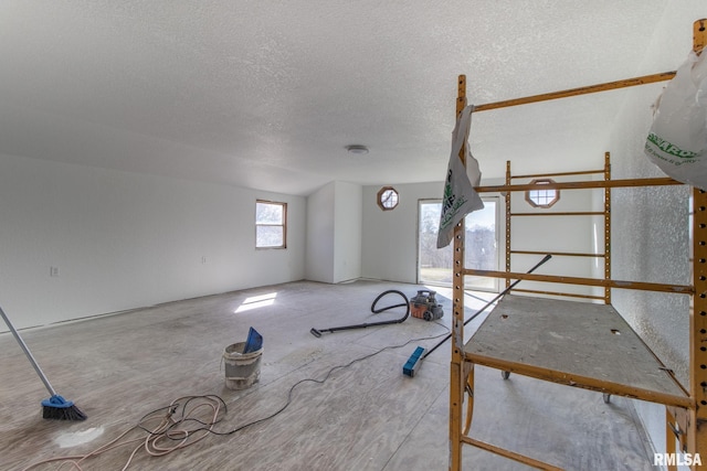 interior space featuring a textured ceiling