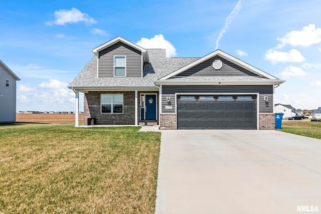 413 Hodges Ct, Chatham, IL 62629 - view of front of house featuring driveway, brick siding, a garage, and a front lawn