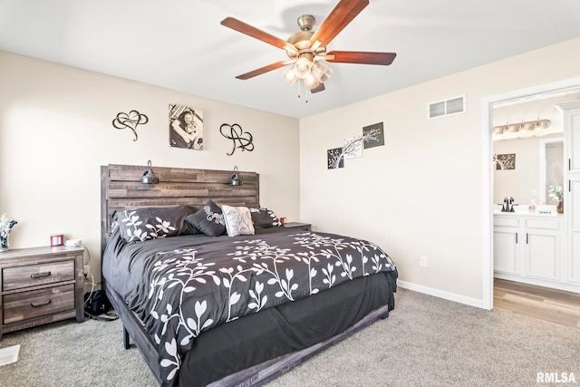 413 Hodges Ct, Chatham, IL 62629 - carpeted bedroom featuring ensuite bathroom, visible vents, baseboards, a ceiling fan, and a sink