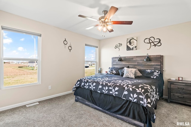 413 Hodges Ct, Chatham, IL 62629 - bedroom featuring baseboards, visible vents, ceiling fan, and carpet