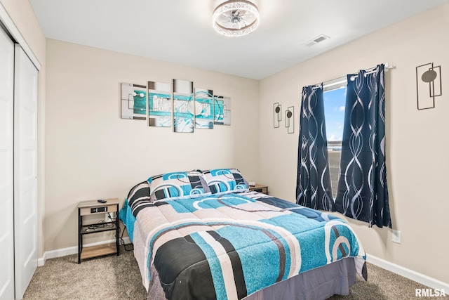 413 Hodges Ct, Chatham, IL 62629 - bedroom with baseboards, visible vents, a closet, and carpet