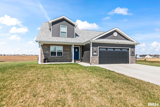 413 Hodges Ct, Chatham, IL 62629 - view of front facade featuring an attached garage, brick siding, a front lawn, and driveway