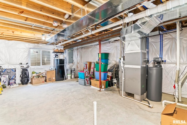 413 Hodges Ct, Chatham, IL 62629 - unfinished basement featuring freestanding refrigerator and electric panel