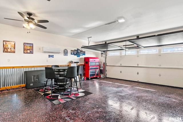 413 Hodges Ct, Chatham, IL 62629 - garage with a wall mounted AC and a ceiling fan
