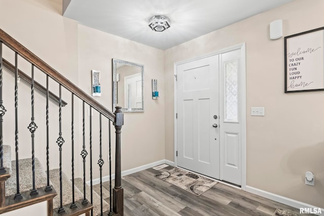 413 Hodges Ct, Chatham, IL 62629 - foyer entrance featuring baseboards, stairs, and wood finished floors