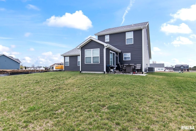 413 Hodges Ct, Chatham, IL 62629 - back of house with central AC unit, a yard, and a patio area