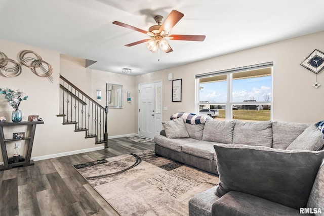 413 Hodges Ct, Chatham, IL 62629 - living room featuring baseboards, wood finished floors, ceiling fan, and stairway