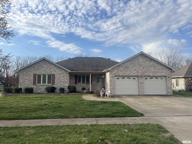 single story home featuring driveway, a front yard, a garage, and brick siding