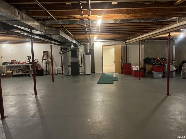 unfinished below grade area with water heater and heating unit