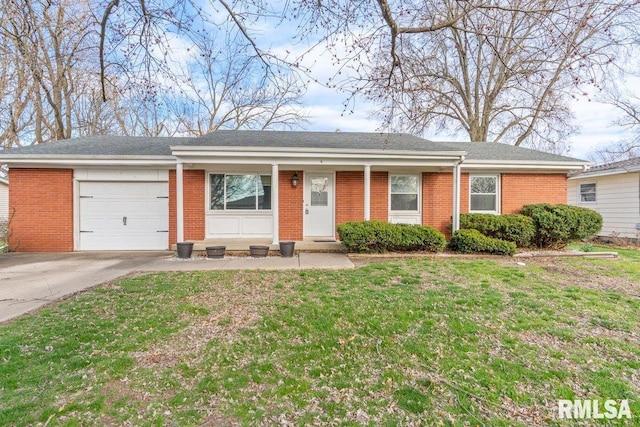 ranch-style house with brick siding, a front yard, a garage, and concrete driveway